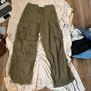 dark green parachute pants